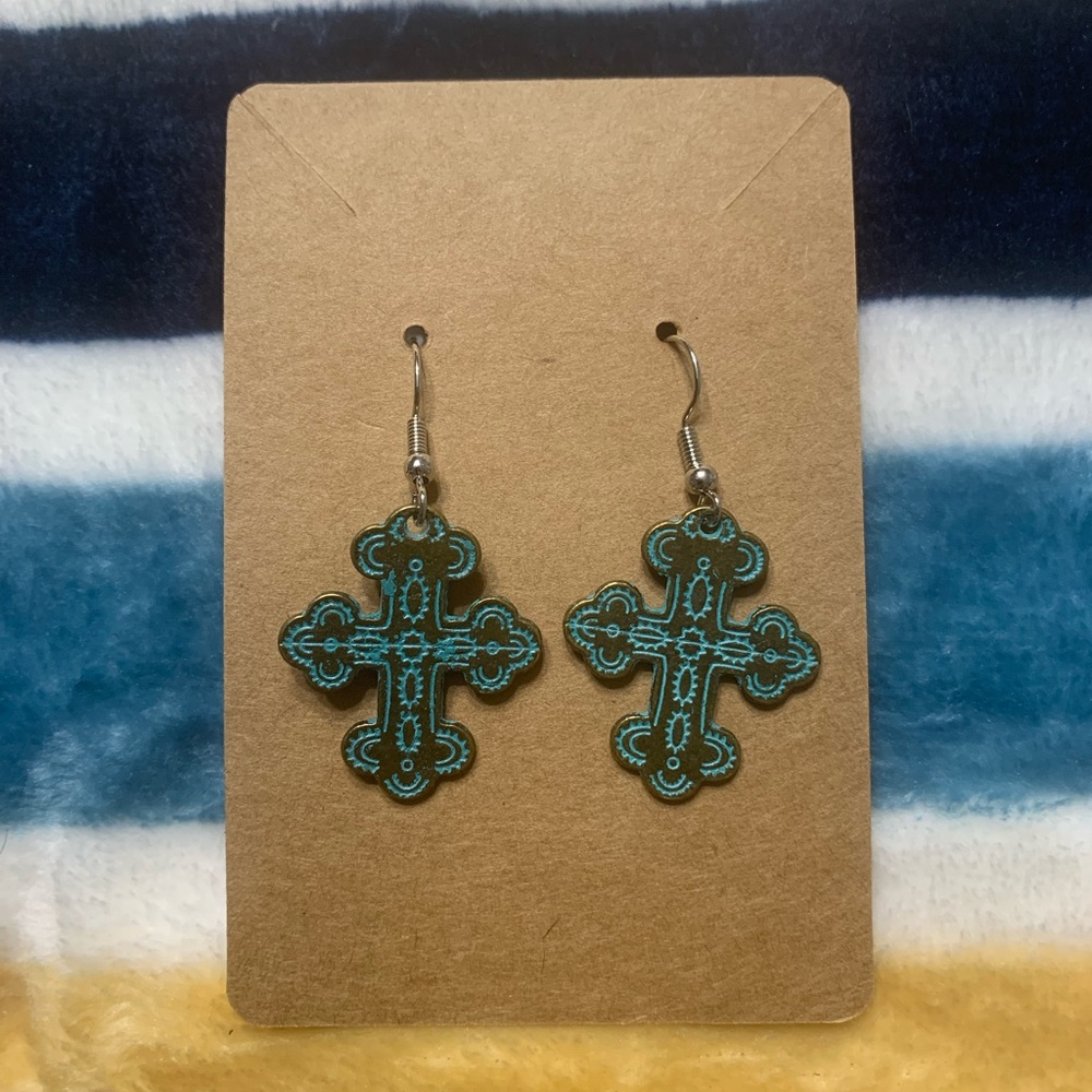 Rounded cross earrings